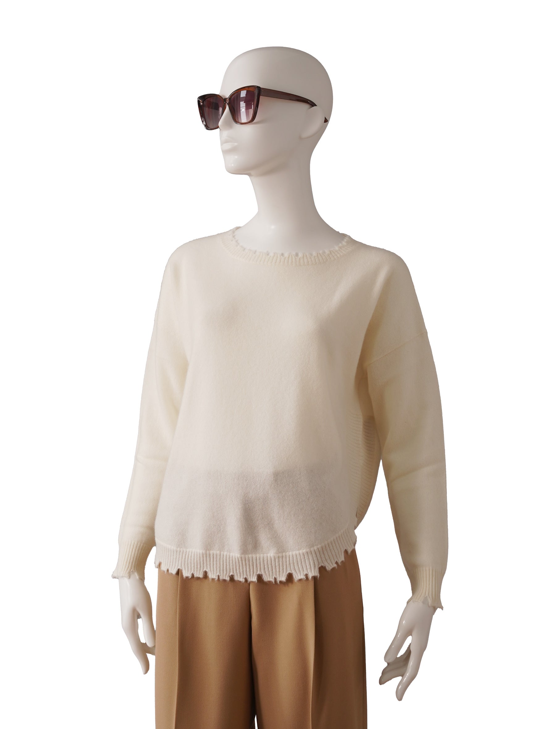 Cream-colored cashmere sweater with destroyed hem